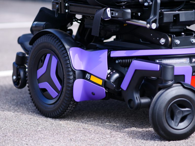 F5 VS standing powerchairs in purple clinical mobility solutions