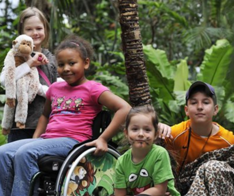 Zippie Simba pediatric wheelchair playing in the jungle